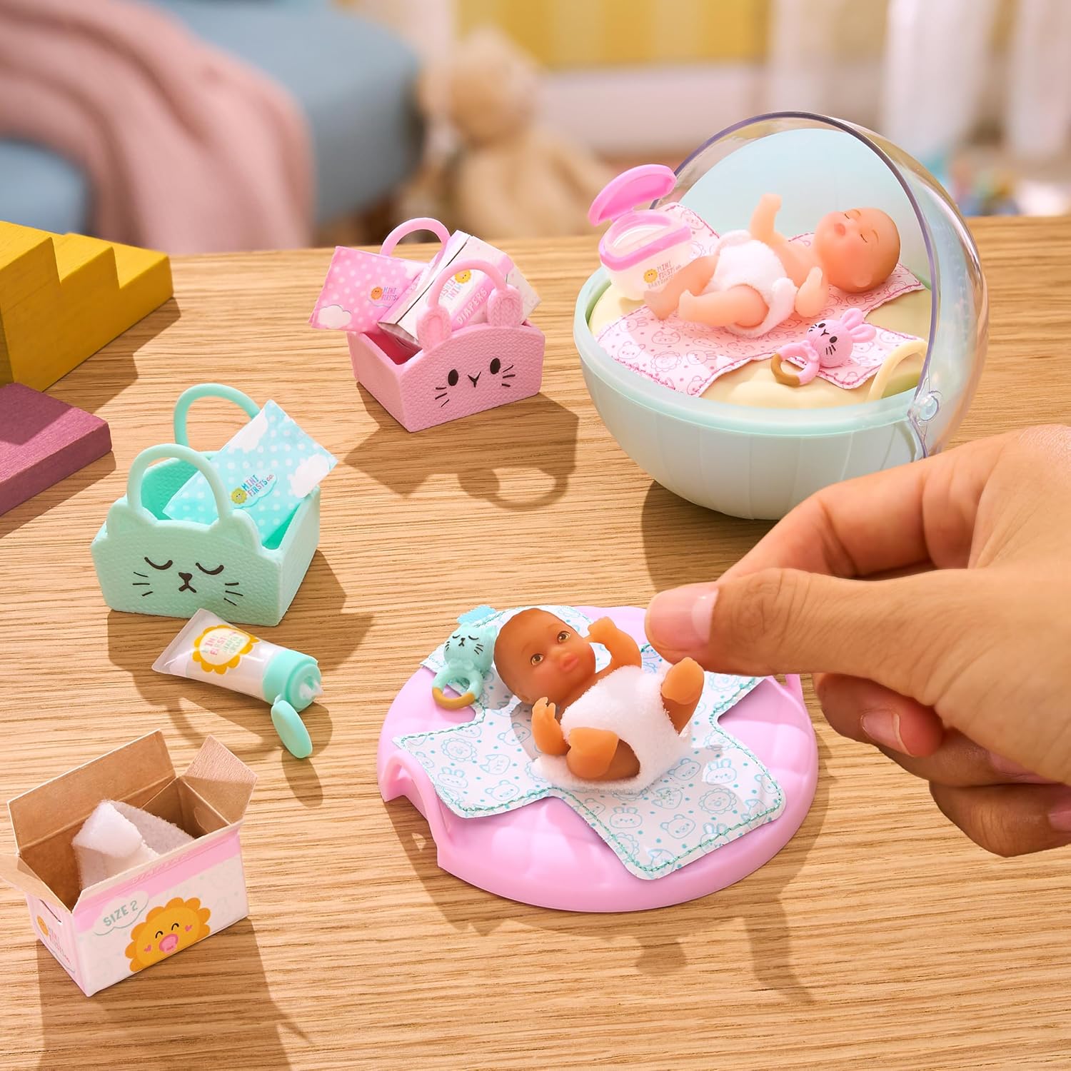 MGA's Miniverse Make It Mini Real Baby Nurture - Blind Packaging - Baby Care Themed Mini Collectibles - 8 Styles Including Rare Twins - Collectors, 8+